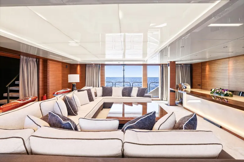 Magna Grecia Yacht Photos Pics Luxurious yacht interior with elegant seating, ocean view, and modern design, Elsflether Werft, 1986.