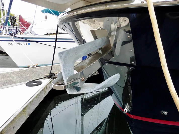  Yacht Photos Pics 2015 Cutwater 30CB boat with anchor at marina dock.