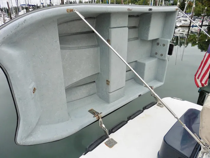  Yacht Photos Pics 2015 Cutwater 30CB boat with a raised dinghy on deck.