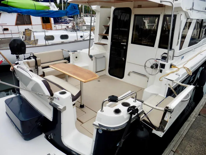  Yacht Photos Pics 2015 Cutwater 30CB boat with spacious deck and seating area.
