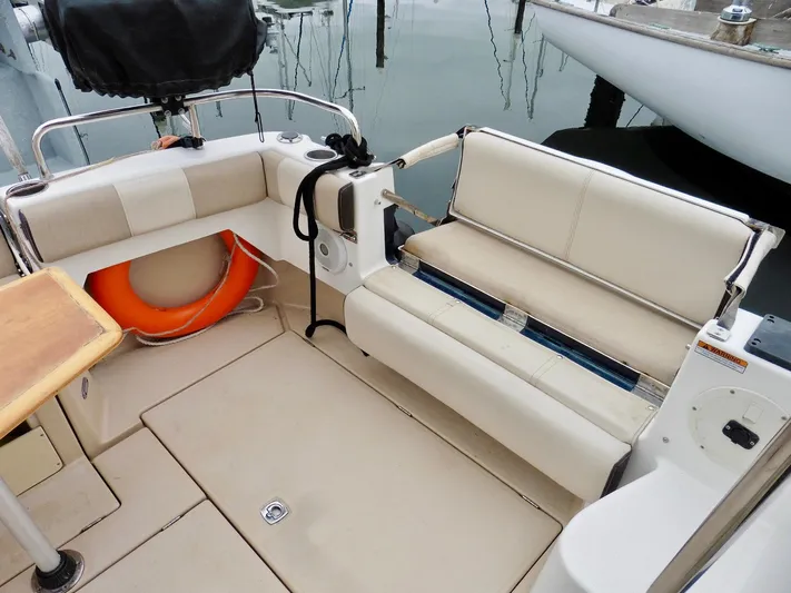  Yacht Photos Pics 2015 Cutwater 30CB boat interior with seating and life preserver.