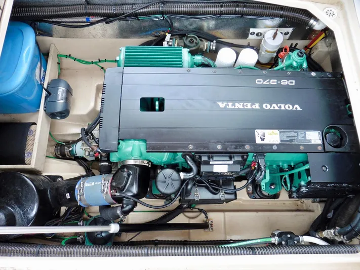  Yacht Photos Pics Volvo Penta engine in 2015 Cutwater 30CB boat, showcasing detailed engine components.