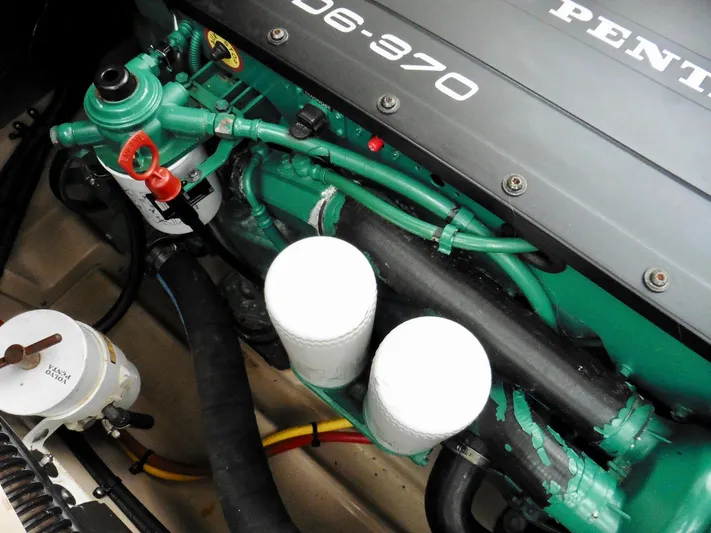  Yacht Photos Pics Volvo Penta engine in 2015 Cutwater 30CB boat, showcasing detailed components.