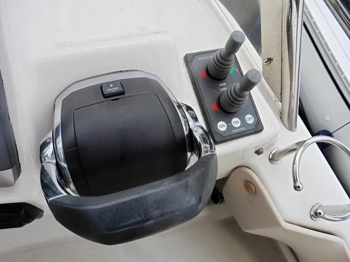  Yacht Photos Pics Cutwater 30CB 2015 boat throttle and control panel close-up.