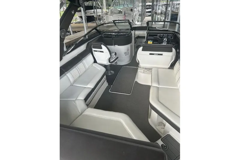  Yacht Photos Pics 2017 Sea Ray SLX 280 boat interior with white seating and modern dashboard.