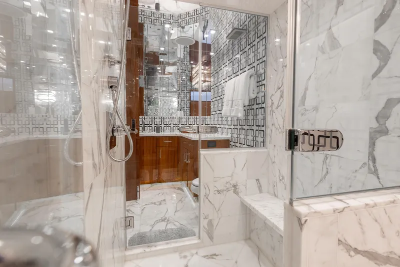 Ritz Sea Yacht Photos Pics Luxurious marble bathroom in 2014 Hatteras 80 Motor Yacht Sky Lounge.