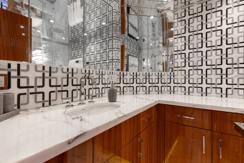 Ritz Sea Yacht Photos Pics Luxurious bathroom in 2014 Hatteras 80 Motor Yacht Sky Lounge with modern geometric tiles.