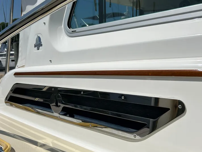 Islander Yacht Photos Pics 2018 Back Cove 32 boat detail with sleek design and polished metal accents.