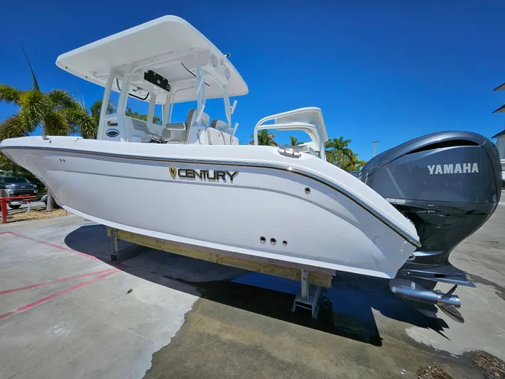  Yacht Photos Pics 2022 Century 2900 Center Console boat with Yamaha engine, displayed outdoors.
