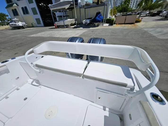  Yacht Photos Pics 2022 Century 2900 Center Console boat with dual engines, docked at a marina.