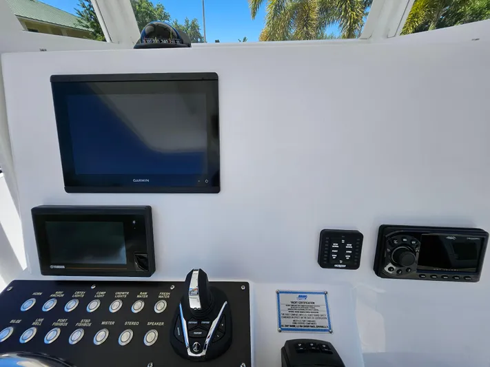  Yacht Photos Pics Century 2900 Center Console 2022 dashboard with navigation screens and controls.