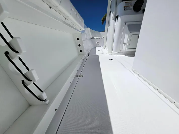  Yacht Photos Pics 2022 Century 2900 Center Console boat interior, showcasing sleek white design and spacious layout.