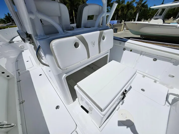  Yacht Photos Pics 2022 Century 2900 Center Console boat interior with seating and storage.