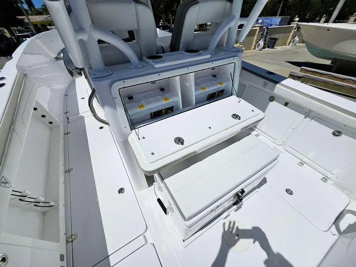  Yacht Photos Pics 2022 Century 2900 Center Console boat interior with seating and storage compartments.