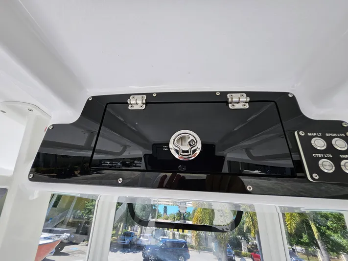  Yacht Photos Pics Century 2900 Center Console 2022 dashboard with control panel and storage compartment.