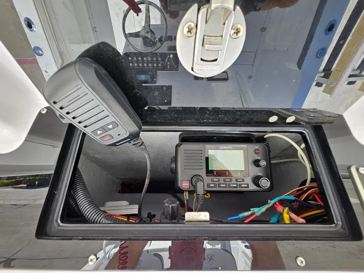  Yacht Photos Pics 2022 Century 2900 Center Console communication equipment with radio and wiring.