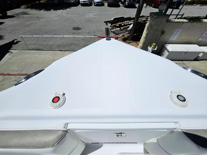  Yacht Photos Pics 2022 Century 2900 Center Console boat, top view of bow area in a parking lot.