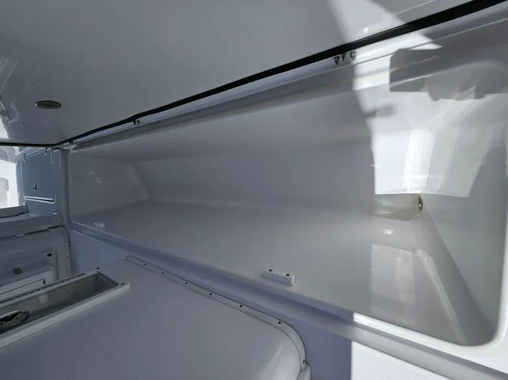  Yacht Photos Pics 2022 Century 2900 Center Console storage compartment, spacious and sleek design.