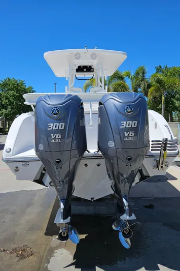  Yacht Photos Pics 2022 Century 2900 Center Console with twin 300 V6 outboard engines, rear view.