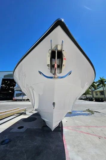 Yacht Photos Pics 2022 Century 2900 Center Console boat, front view, displayed outdoors under clear blue sky.