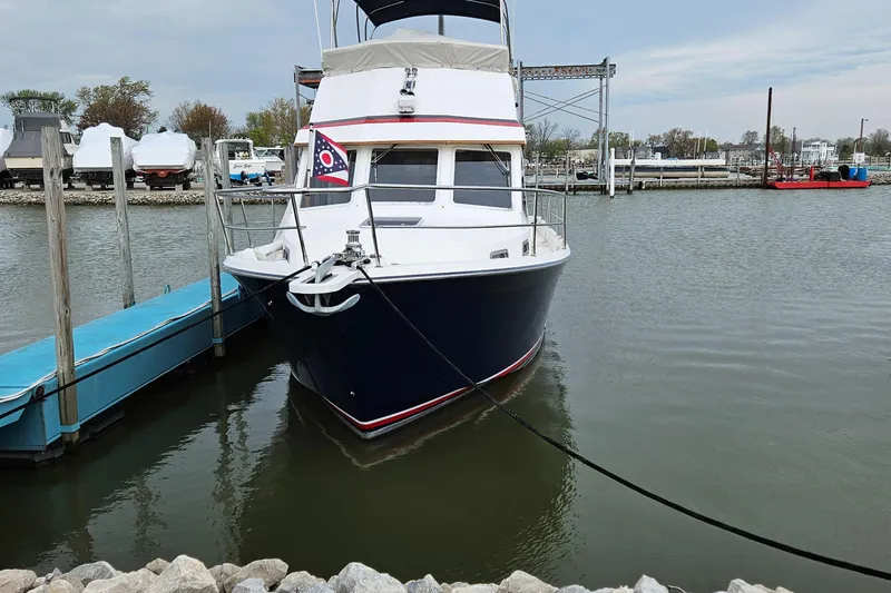 Raindance Yacht Photos Pics 1998 Sabre 36 Fast Trawler docked at marina, front view.