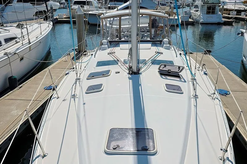 Mustang III Yacht Photos Pics 2007 Beneteau Oceanis 423 sailboat docked at marina, showcasing deck and hatches.