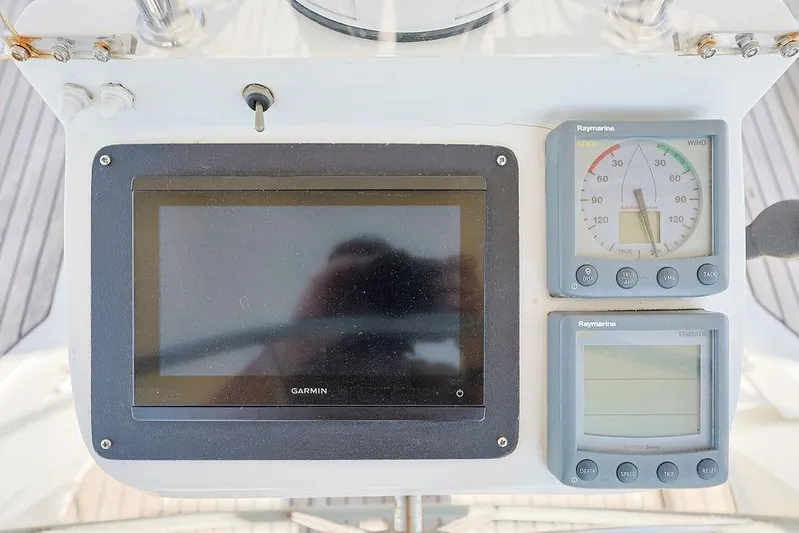 Mustang III Yacht Photos Pics Garmin and Raymarine navigation instruments on 2007 Beneteau Oceanis 423 yacht dashboard.
