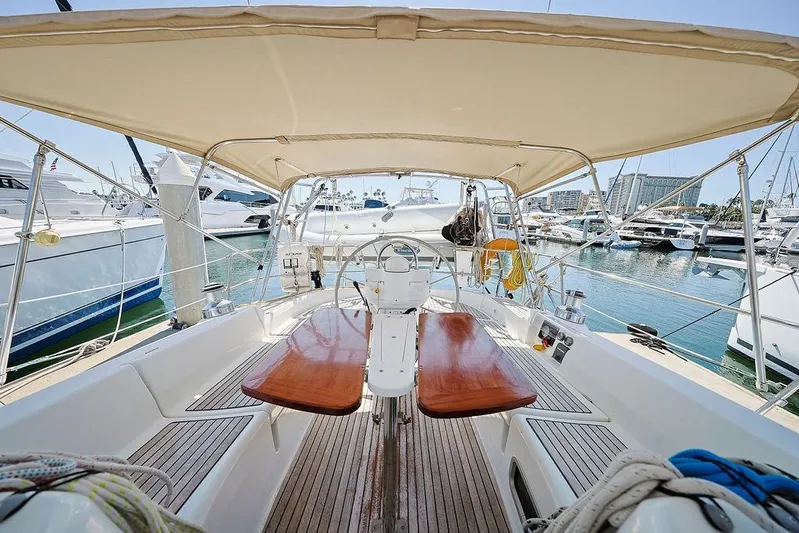 Mustang III Yacht Photos Pics 2007 Beneteau Oceanis 423 yacht cockpit with canopy, docked in marina.