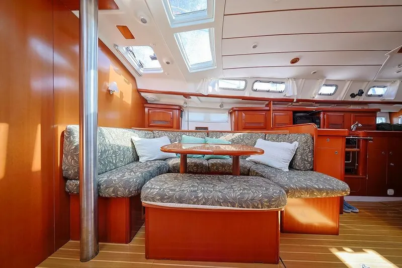 Mustang III Yacht Photos Pics Interior of 2007 Beneteau Oceanis 423 yacht with cozy seating and wooden finishes.