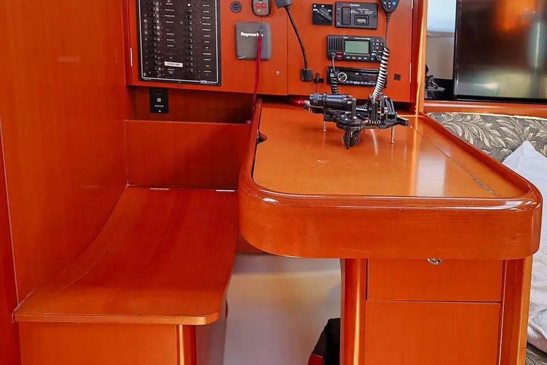 Mustang III Yacht Photos Pics Navigation station of 2007 Beneteau Oceanis 423 yacht with control panel and equipment.