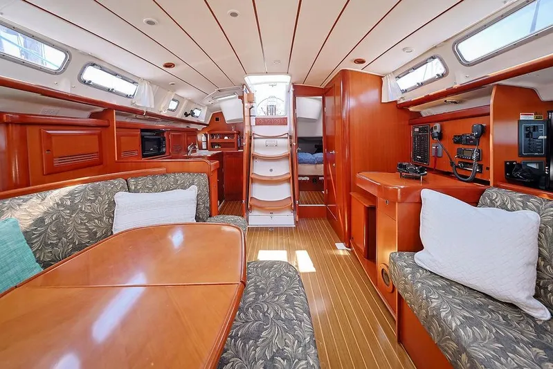 Mustang III Yacht Photos Pics Interior of 2007 Beneteau Oceanis 423 yacht with wood finish and cozy seating.