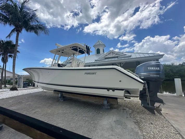  Yacht Photos Pics 2009 Pursuit C 310 Center Console boat on display with Yamaha engine.