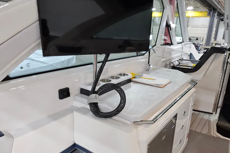  Yacht Photos Pics Interior of 2026 Formula 380 Super Sport Crossover OB with TV and counter space.