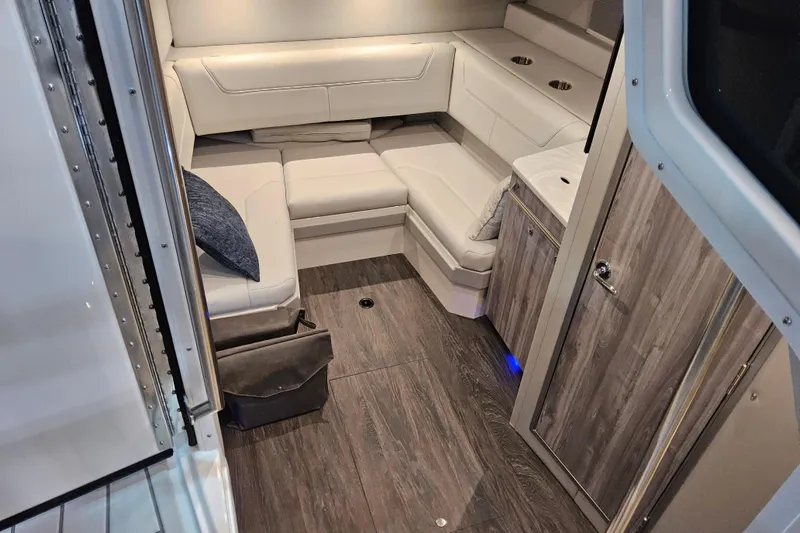  Yacht Photos Pics Interior of 2026 Formula 380 Super Sport Crossover OB with modern seating and wood flooring.