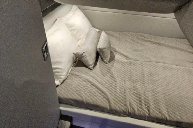  Yacht Photos Pics Interior cabin of 2026 Formula 380 Super Sport Crossover OB with cozy bedding.