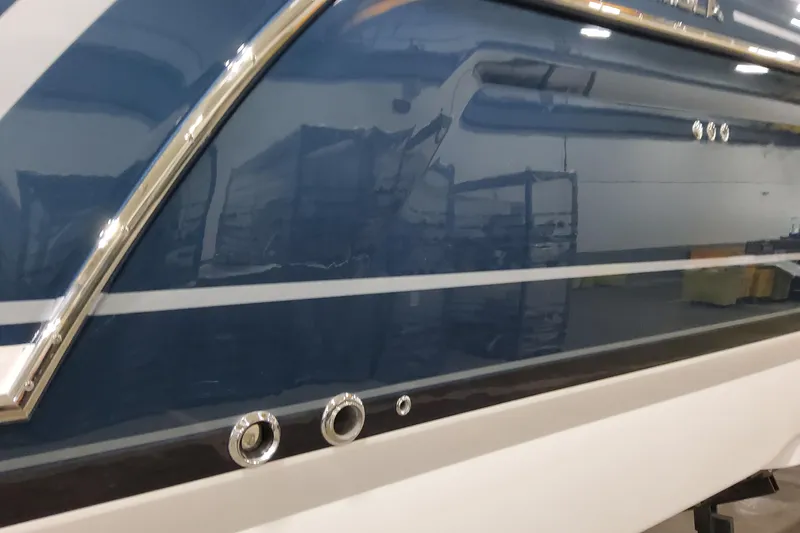  Yacht Photos Pics 2026 Formula 380 Super Sport Crossover OB boat exterior with sleek blue and white design.