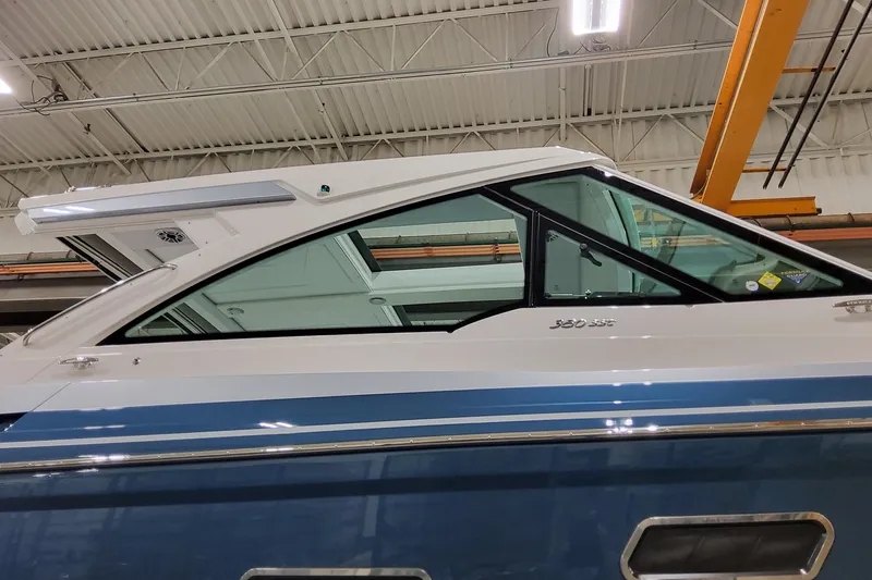  Yacht Photos Pics 2026 Formula 380 Super Sport Crossover OB boat in a warehouse setting.