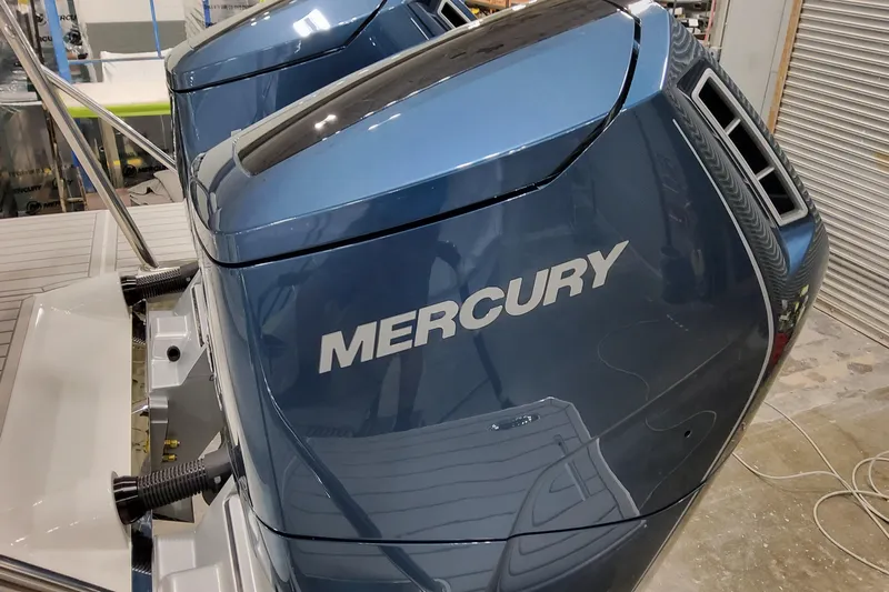  Yacht Photos Pics 2026 Formula 380 Super Sport Crossover OB with Mercury outboard engines in a workshop.