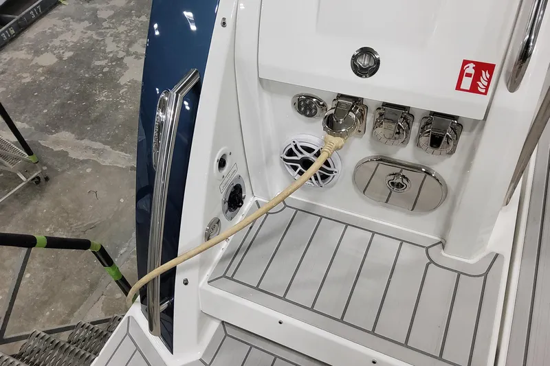  Yacht Photos Pics 2026 Formula 380 Super Sport Crossover OB boat deck with utility connections and speaker.