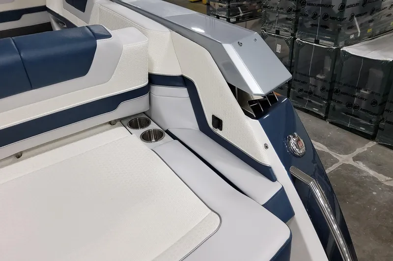  Yacht Photos Pics 2026 Formula 380 Super Sport Crossover OB interior with blue and white seating and cup holders.
