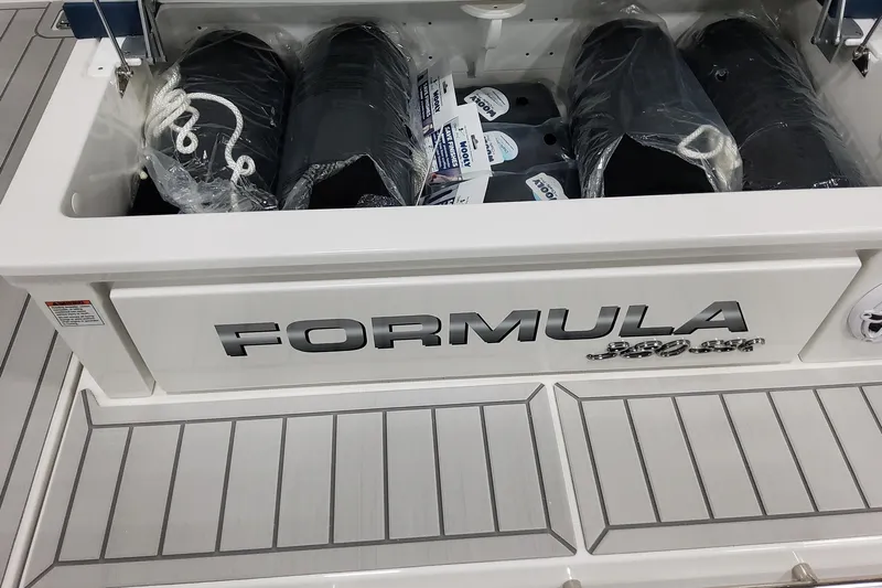  Yacht Photos Pics 2026 Formula 380 Super Sport Crossover OB storage compartment with fenders and ropes.