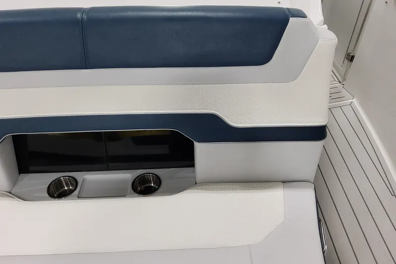  Yacht Photos Pics 2026 Formula 380 Super Sport Crossover OB interior seating with cup holders, blue and white upholstery.