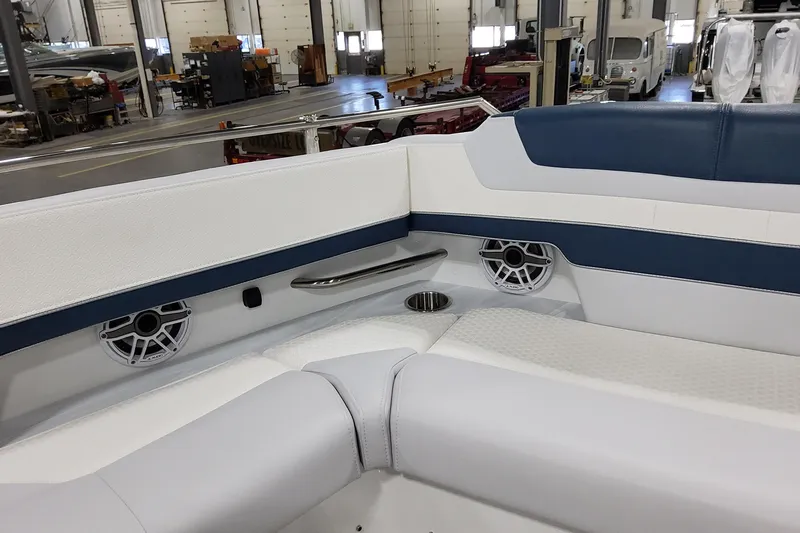  Yacht Photos Pics 2026 Formula 380 Super Sport Crossover OB interior with white and blue seating, cup holder, and speakers.