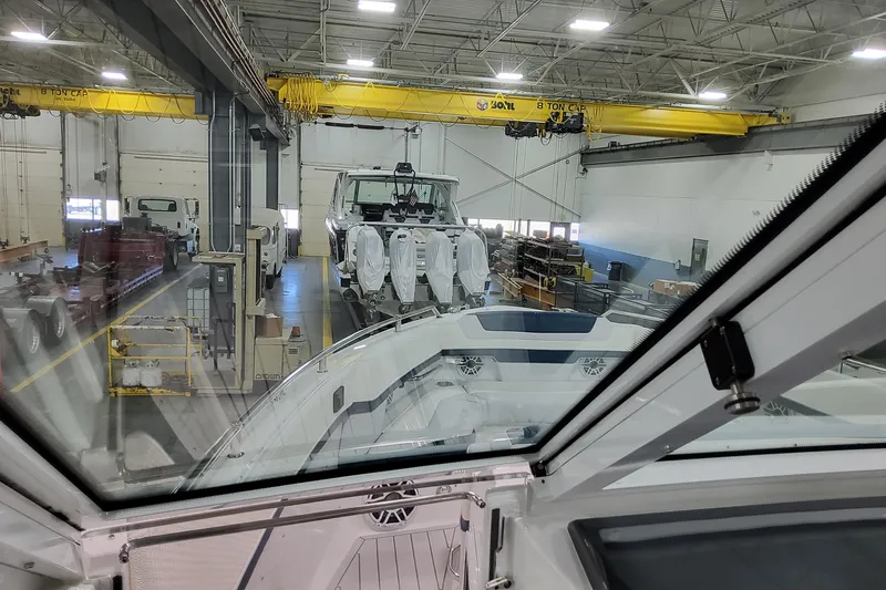  Yacht Photos Pics 2026 Formula 380 Super Sport Crossover OB in a factory setting, viewed from inside.