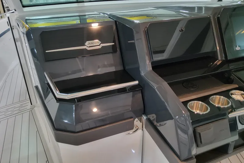  Yacht Photos Pics 2026 Formula 380 Super Sport Crossover OB boat interior with sleek design and cup holders.