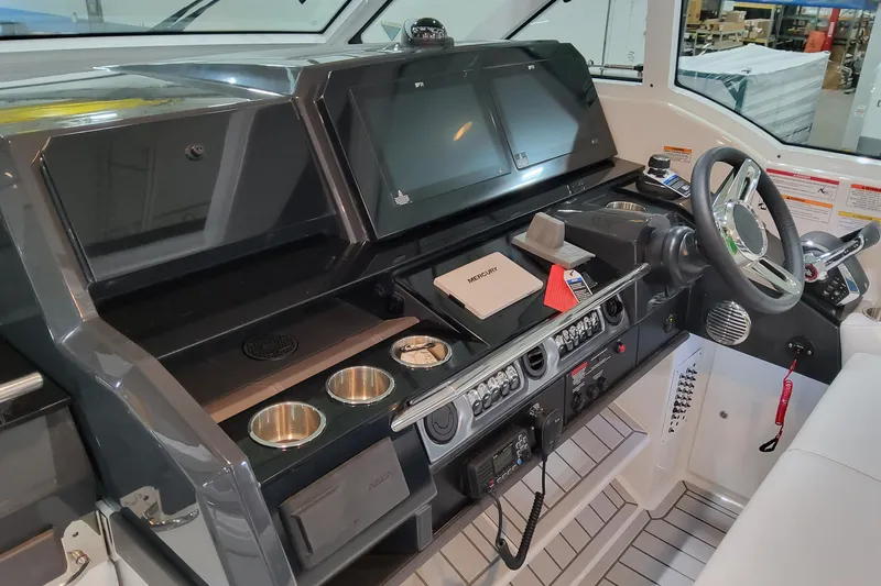  Yacht Photos Pics Helm of 2026 Formula 380 Super Sport Crossover OB with modern controls and displays.