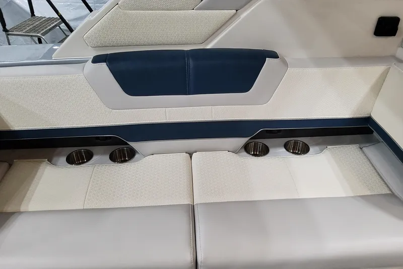  Yacht Photos Pics 2026 Formula 380 Super Sport Crossover OB interior seating with cup holders, featuring modern design.