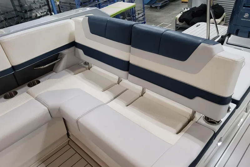  Yacht Photos Pics Luxurious seating on 2026 Formula 380 Super Sport Crossover OB boat, featuring sleek design and cup holders.