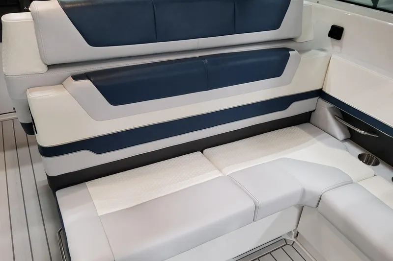  Yacht Photos Pics 2026 Formula 380 Super Sport Crossover OB interior seating, featuring blue and white upholstery.