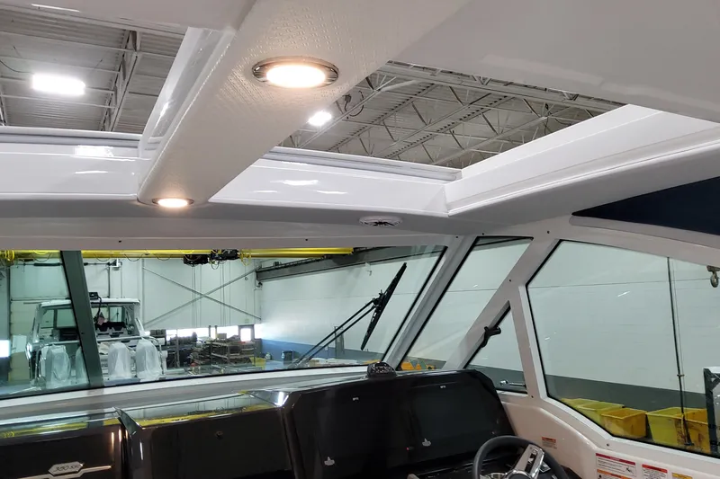  Yacht Photos Pics Interior view of 2026 Formula 380 Super Sport Crossover OB boat with modern lighting.